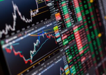 Koyu arkaplan üzerinde yeşil ve kırmızı renkli borsa grafik göstergeleri.