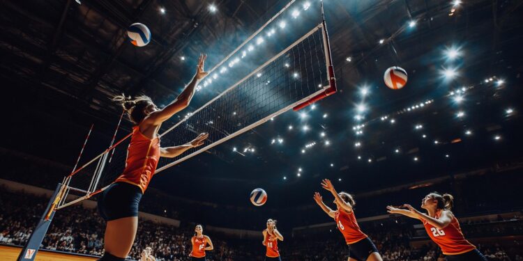 Kapalı salonda voleybol maçı oynayan profesyonel sporcular ve file.